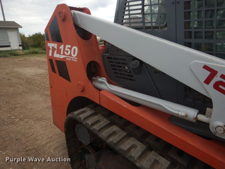 image for item FG9779 2004 Takeuchi TL150 skid steer