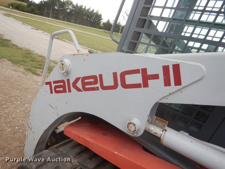image for item FG9779 2004 Takeuchi TL150 skid steer
