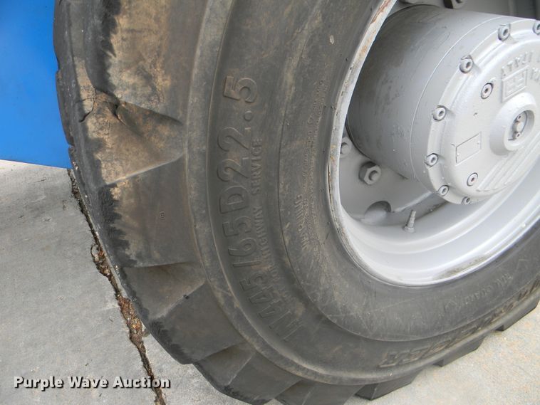 image for item G1935 2002 Genie S-125 boom lift