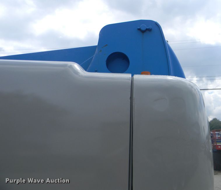 image for item G1935 2002 Genie S-125 boom lift