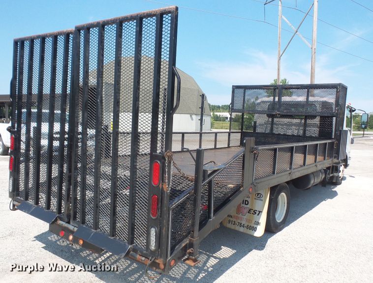 image for item DE2379 2008 Isuzu NPR-HD Crew Cab flatbed truck