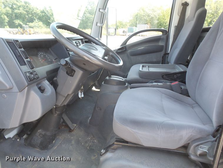 image for item DE2379 2008 Isuzu NPR-HD Crew Cab flatbed truck