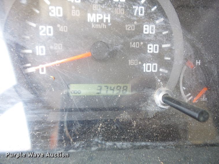 image for item DE2379 2008 Isuzu NPR-HD Crew Cab flatbed truck