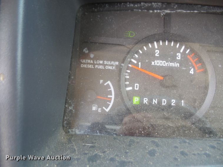 image for item DE2379 2008 Isuzu NPR-HD Crew Cab flatbed truck