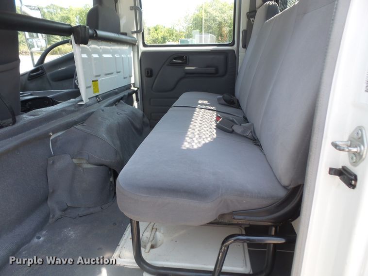 image for item DE2379 2008 Isuzu NPR-HD Crew Cab flatbed truck