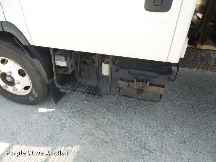 image for item DE2379 2008 Isuzu NPR-HD Crew Cab flatbed truck