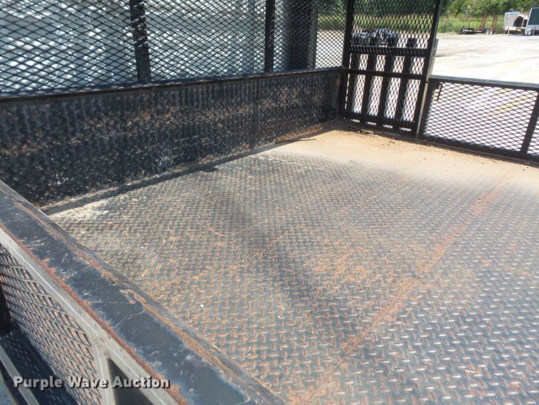 image for item DE2379 2008 Isuzu NPR-HD Crew Cab flatbed truck