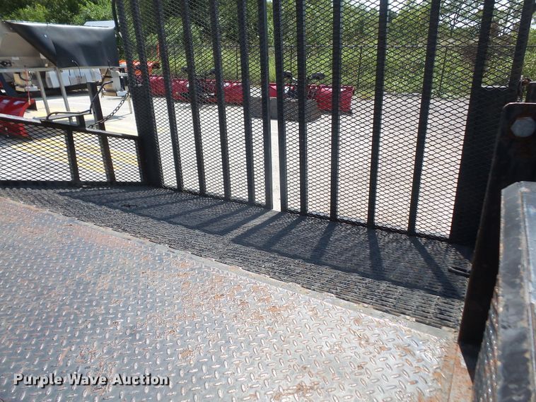 image for item DE2379 2008 Isuzu NPR-HD Crew Cab flatbed truck