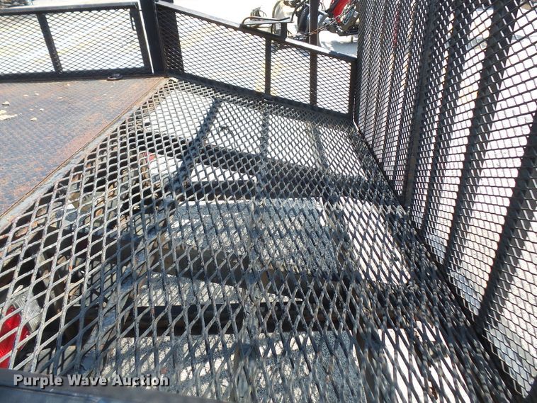 image for item DE2379 2008 Isuzu NPR-HD Crew Cab flatbed truck