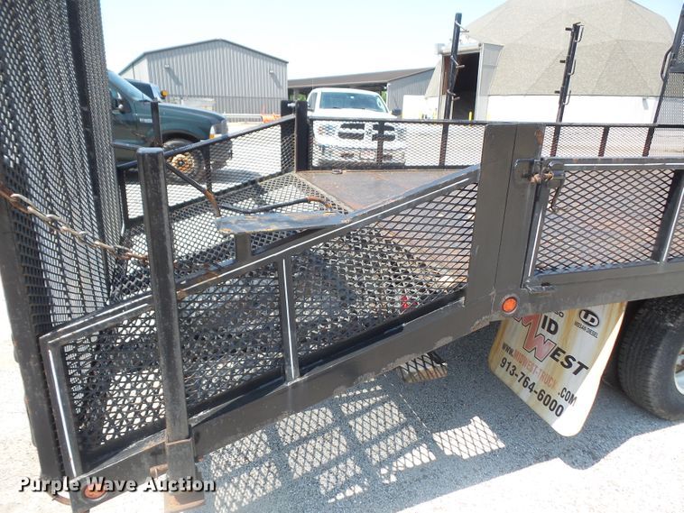 image for item DE2379 2008 Isuzu NPR-HD Crew Cab flatbed truck