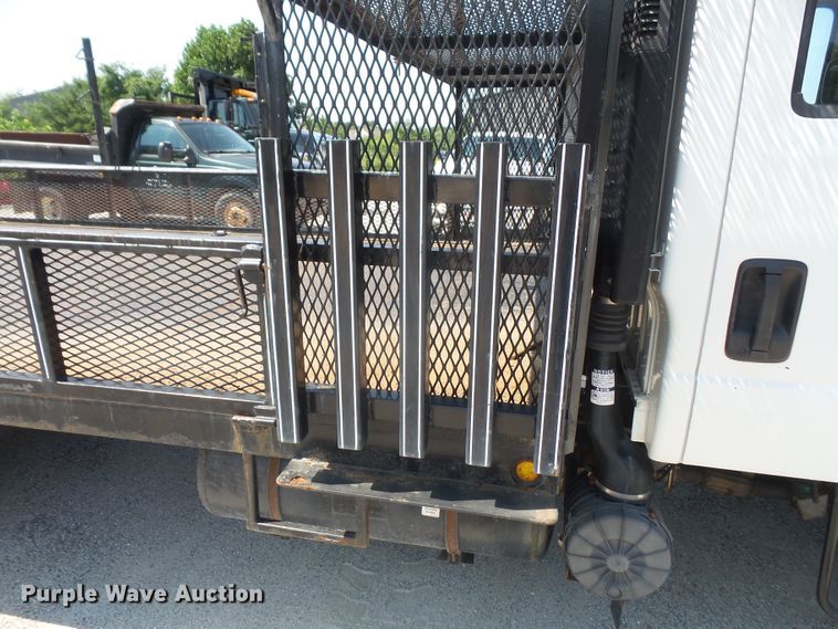 image for item DE2379 2008 Isuzu NPR-HD Crew Cab flatbed truck