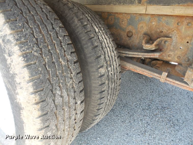 image for item DE2379 2008 Isuzu NPR-HD Crew Cab flatbed truck