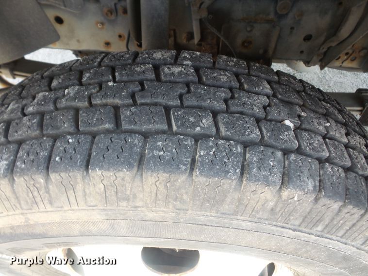 image for item DE2379 2008 Isuzu NPR-HD Crew Cab flatbed truck