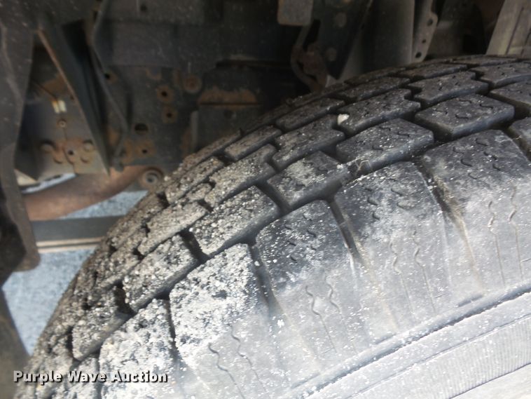 image for item DE2379 2008 Isuzu NPR-HD Crew Cab flatbed truck