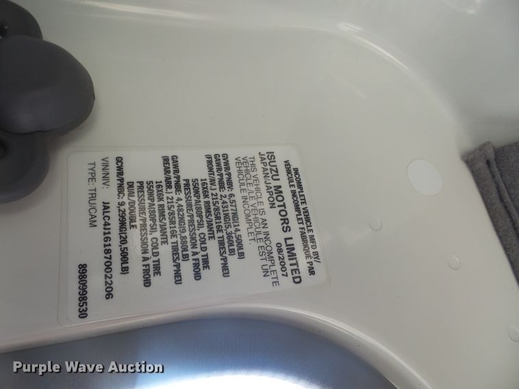 image for item DE2379 2008 Isuzu NPR-HD Crew Cab flatbed truck