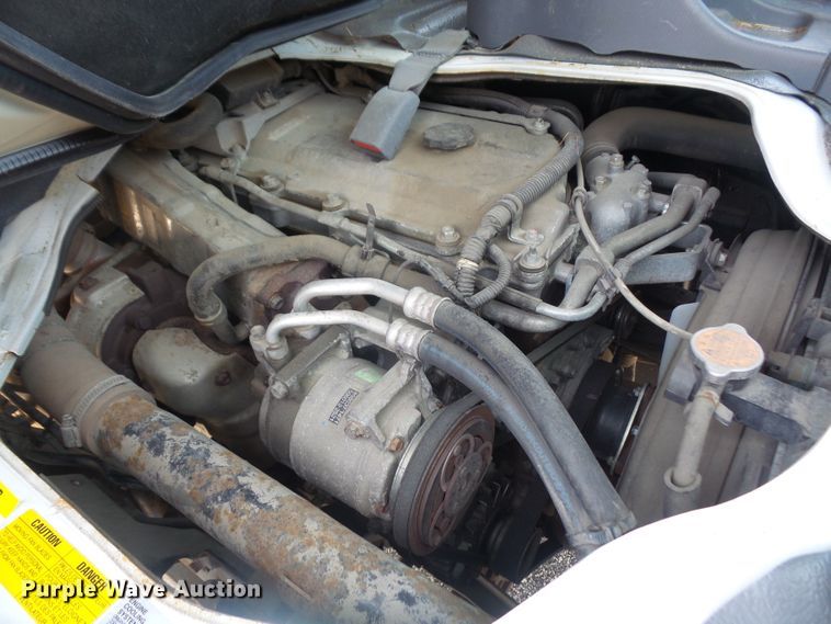 image for item DE2379 2008 Isuzu NPR-HD Crew Cab flatbed truck