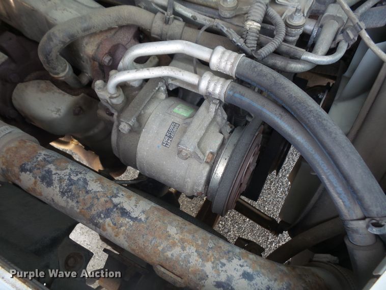 image for item DE2379 2008 Isuzu NPR-HD Crew Cab flatbed truck