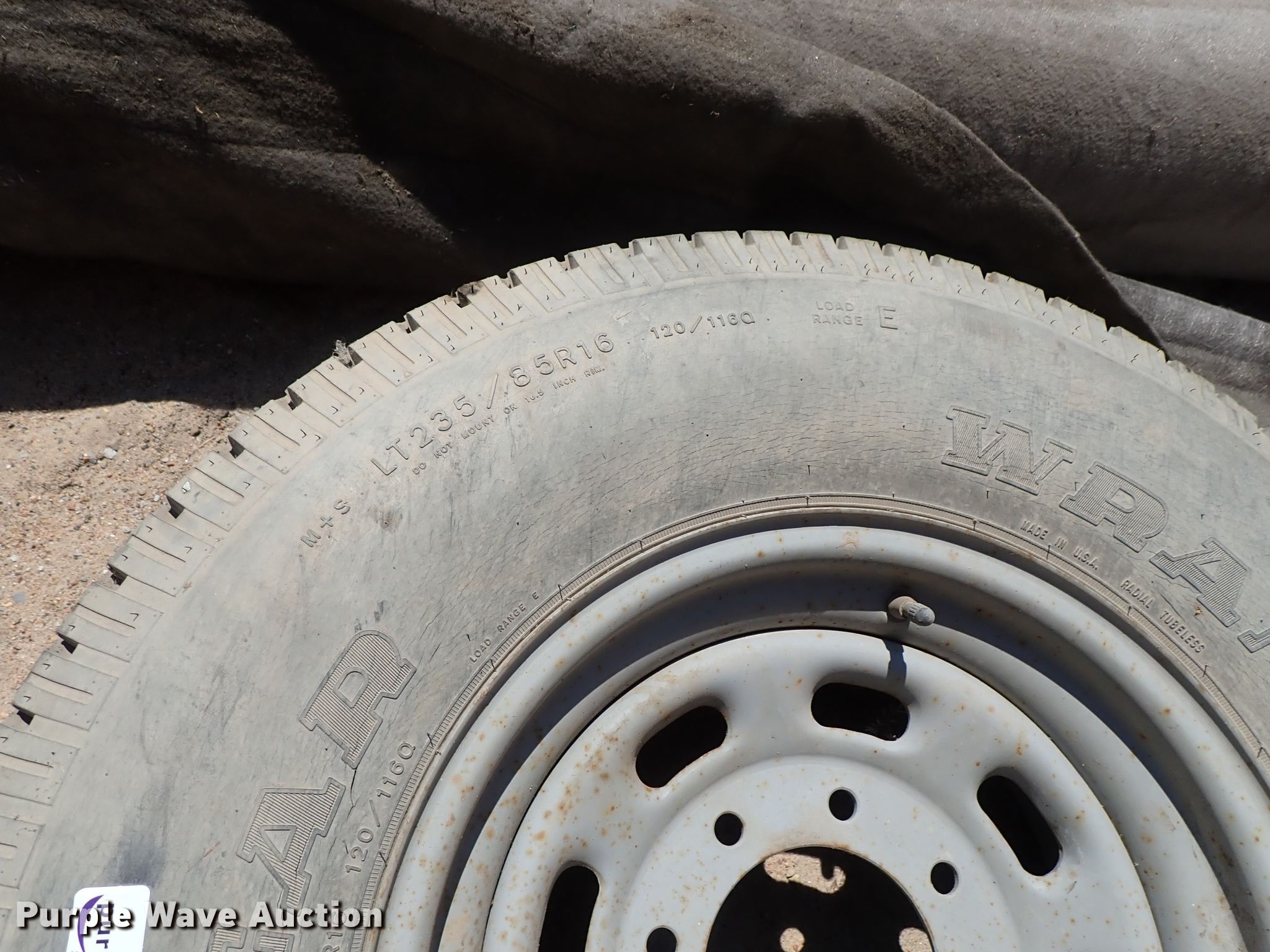 Goodyear 235/85R16 tire and wheel in Pratt, KS Item GB9366 sold