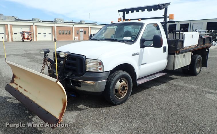 image for item DE1056 2006 Ford F350 Super Duty flat dump bed pickup truck