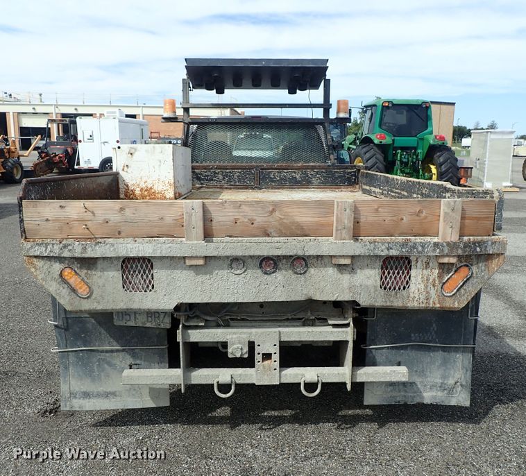 image for item DE1056 2006 Ford F350 Super Duty flat dump bed pickup truck