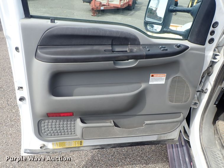 image for item DE1056 2006 Ford F350 Super Duty flat dump bed pickup truck