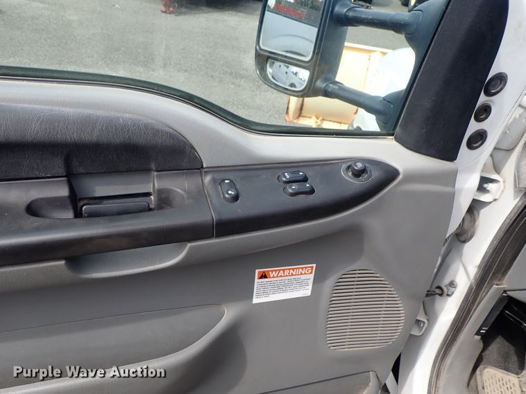 image for item DE1056 2006 Ford F350 Super Duty flat dump bed pickup truck