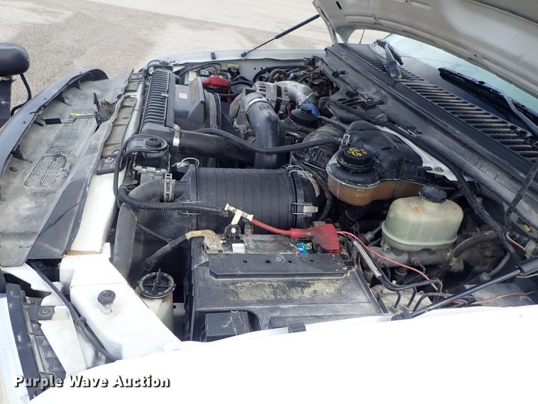 image for item DE1056 2006 Ford F350 Super Duty flat dump bed pickup truck