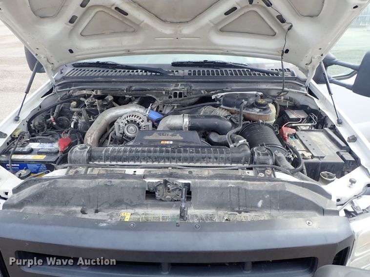 image for item DE1056 2006 Ford F350 Super Duty flat dump bed pickup truck