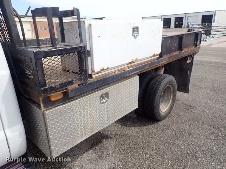 image for item DE1056 2006 Ford F350 Super Duty flat dump bed pickup truck