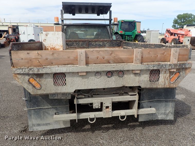 image for item DE1056 2006 Ford F350 Super Duty flat dump bed pickup truck