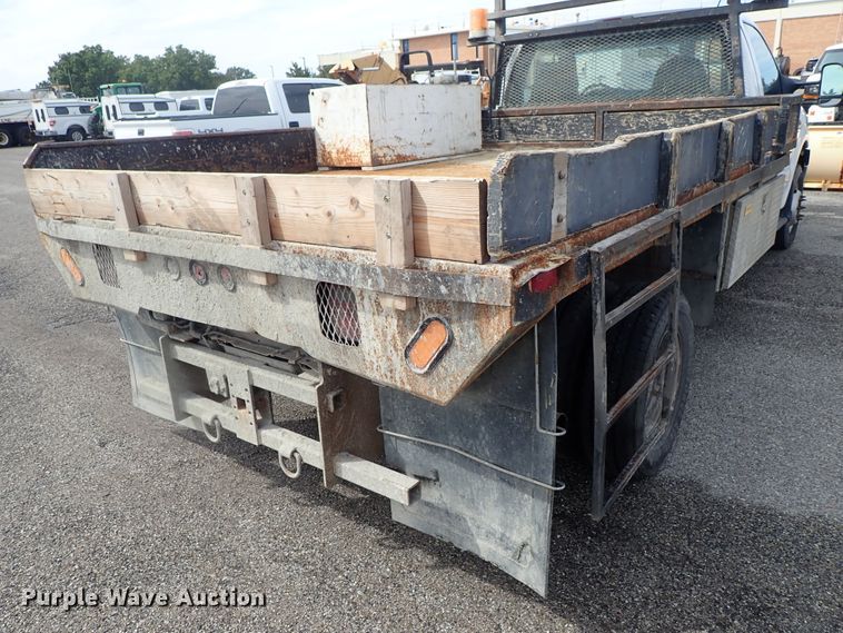 image for item DE1056 2006 Ford F350 Super Duty flat dump bed pickup truck