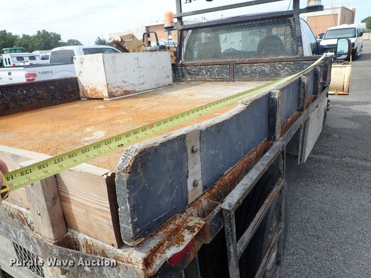 image for item DE1056 2006 Ford F350 Super Duty flat dump bed pickup truck