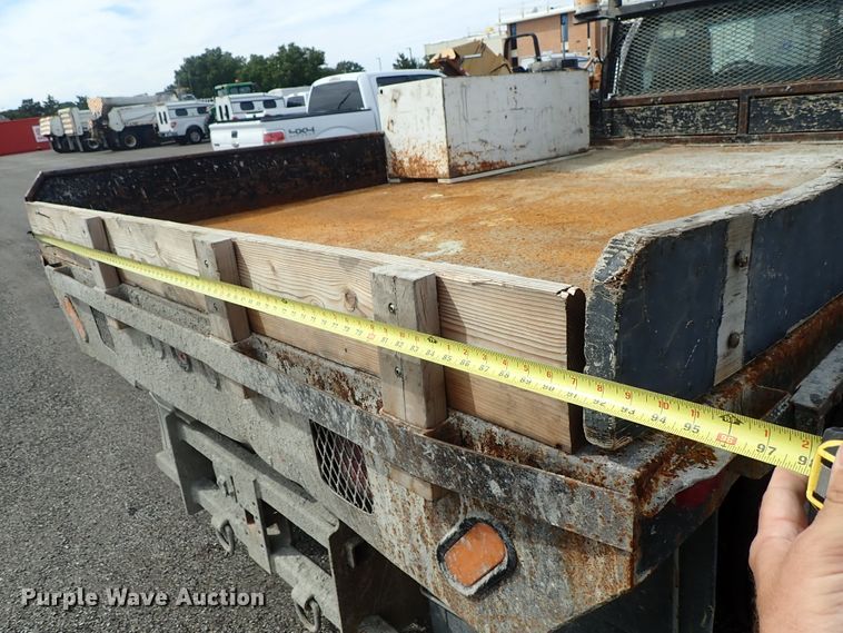 image for item DE1056 2006 Ford F350 Super Duty flat dump bed pickup truck