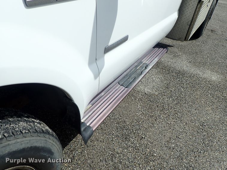 image for item DE1056 2006 Ford F350 Super Duty flat dump bed pickup truck