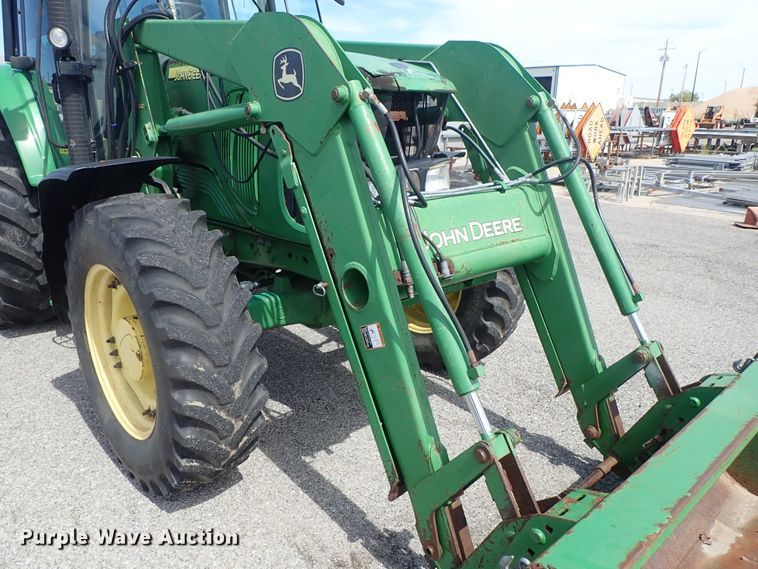 image for item DE1057 2004 John Deere 7220 MFWD tractor