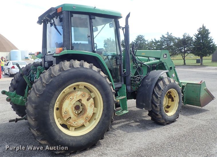 image for item DE1058 John Deere 6310 MFWD tractor