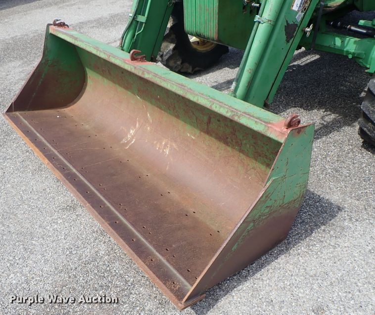 image for item DE1058 John Deere 6310 MFWD tractor