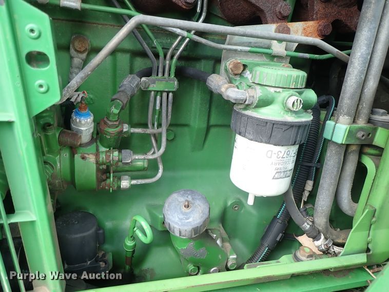 image for item DE1058 John Deere 6310 MFWD tractor