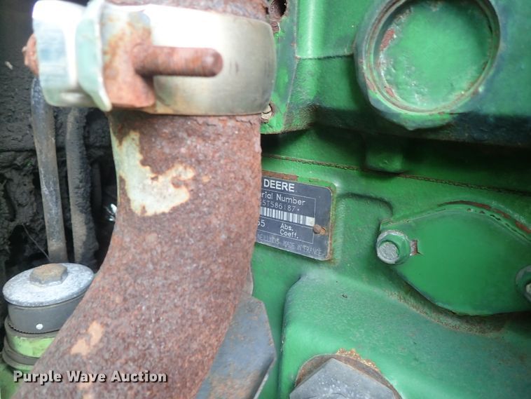 image for item DE1058 John Deere 6310 MFWD tractor