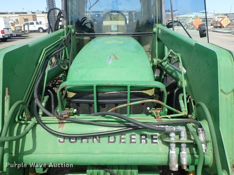 image for item DE1058 John Deere 6310 MFWD tractor