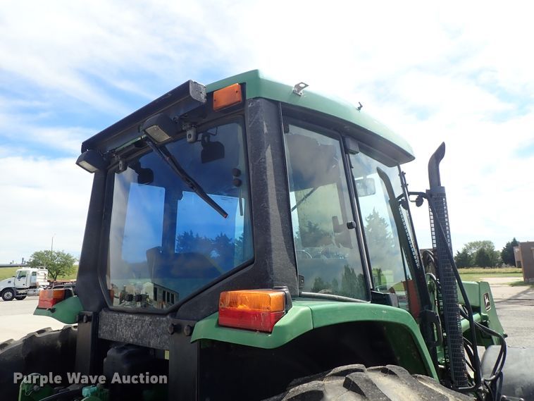 image for item DE1058 John Deere 6310 MFWD tractor