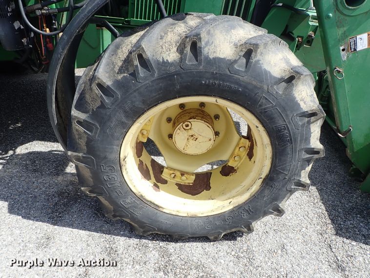 image for item DE1058 John Deere 6310 MFWD tractor