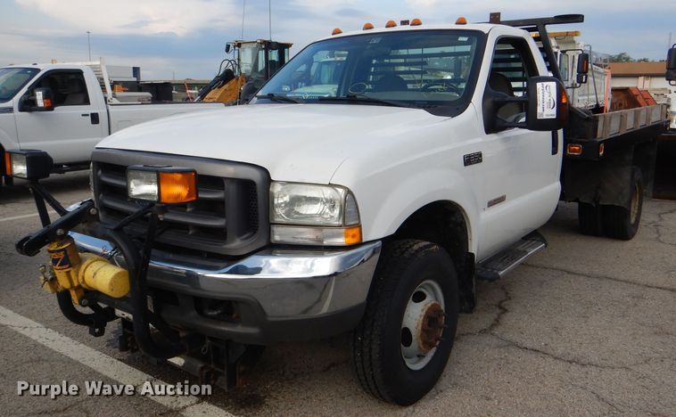 image for item DG4965 2004 Ford F350 Super Duty dump flatbed pickup truck
