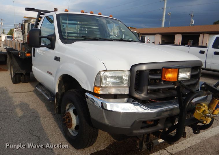 image for item DG4965 2004 Ford F350 Super Duty dump flatbed pickup truck