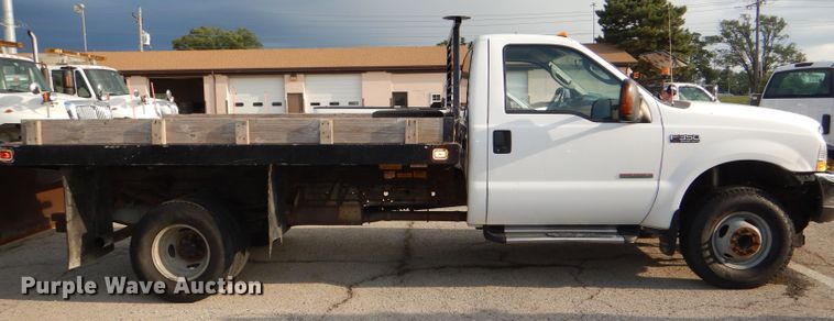 image for item DG4965 2004 Ford F350 Super Duty dump flatbed pickup truck