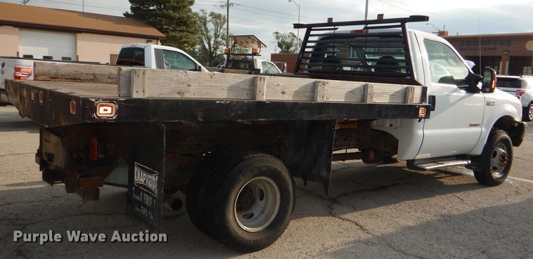 image for item DG4965 2004 Ford F350 Super Duty dump flatbed pickup truck