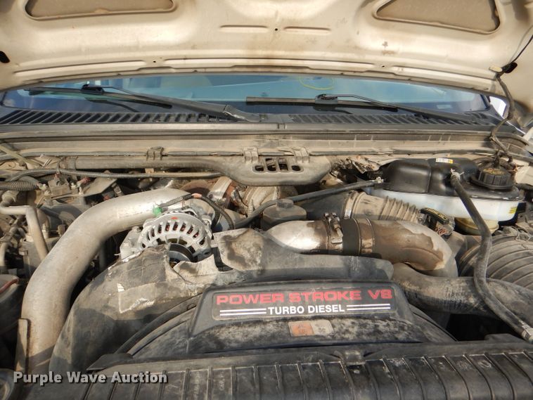 image for item DG4965 2004 Ford F350 Super Duty dump flatbed pickup truck