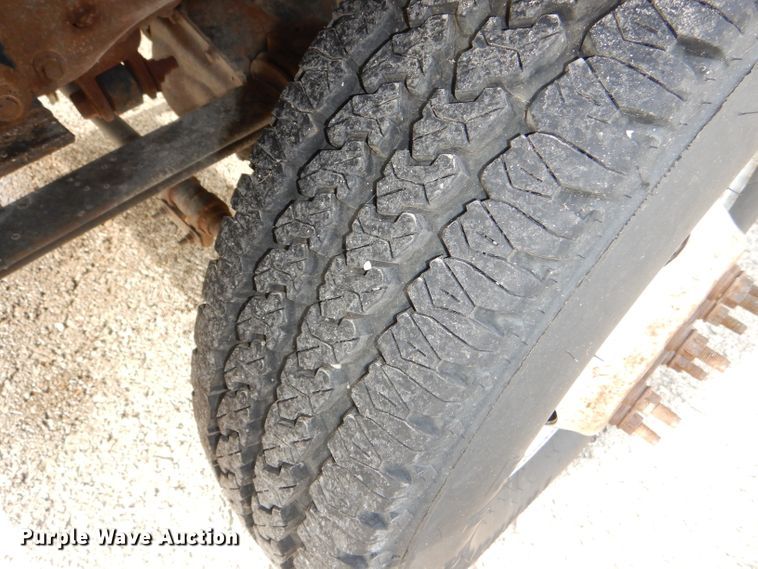 image for item DG4965 2004 Ford F350 Super Duty dump flatbed pickup truck