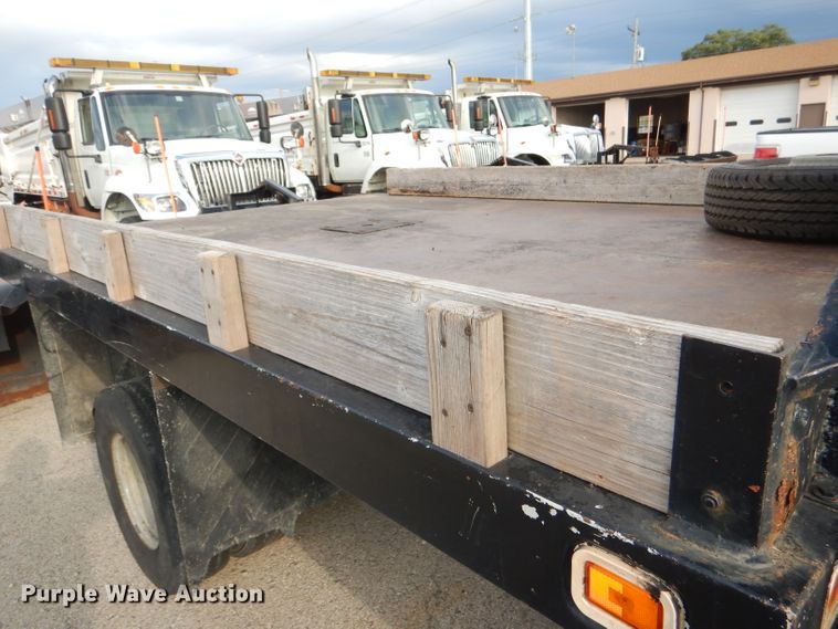 image for item DG4965 2004 Ford F350 Super Duty dump flatbed pickup truck