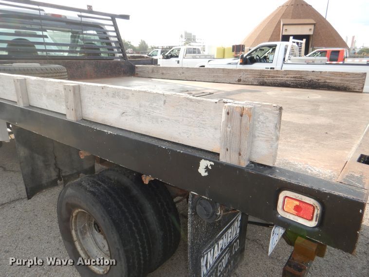 image for item DG4965 2004 Ford F350 Super Duty dump flatbed pickup truck